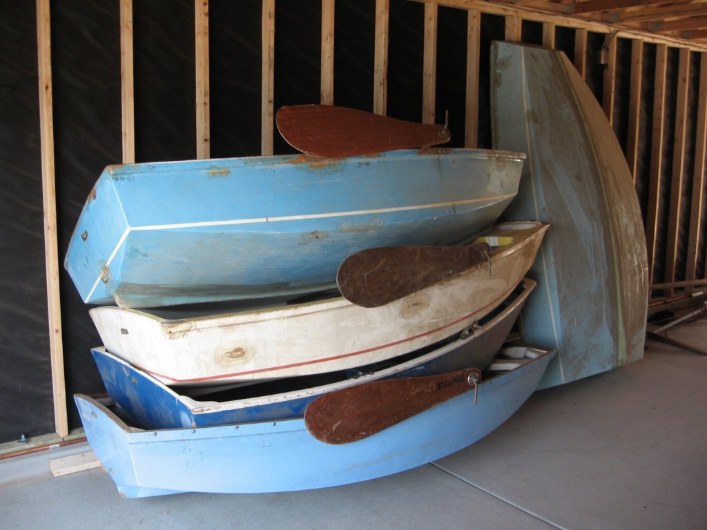 Dirty sail boats inside the Boat House